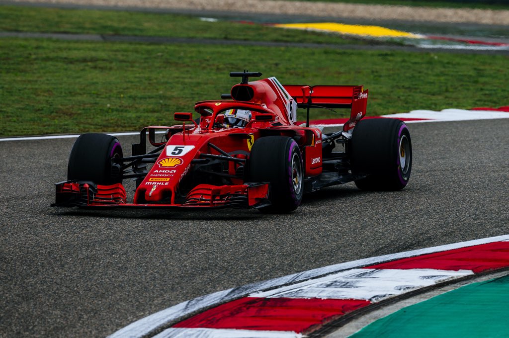 Выиграл феррари. Ferrari f1 Sebastian Vettel. Vettel Ferrari 2018 China. Formula 1 Ferrari 2010. Sebastian Vettel cars 2.