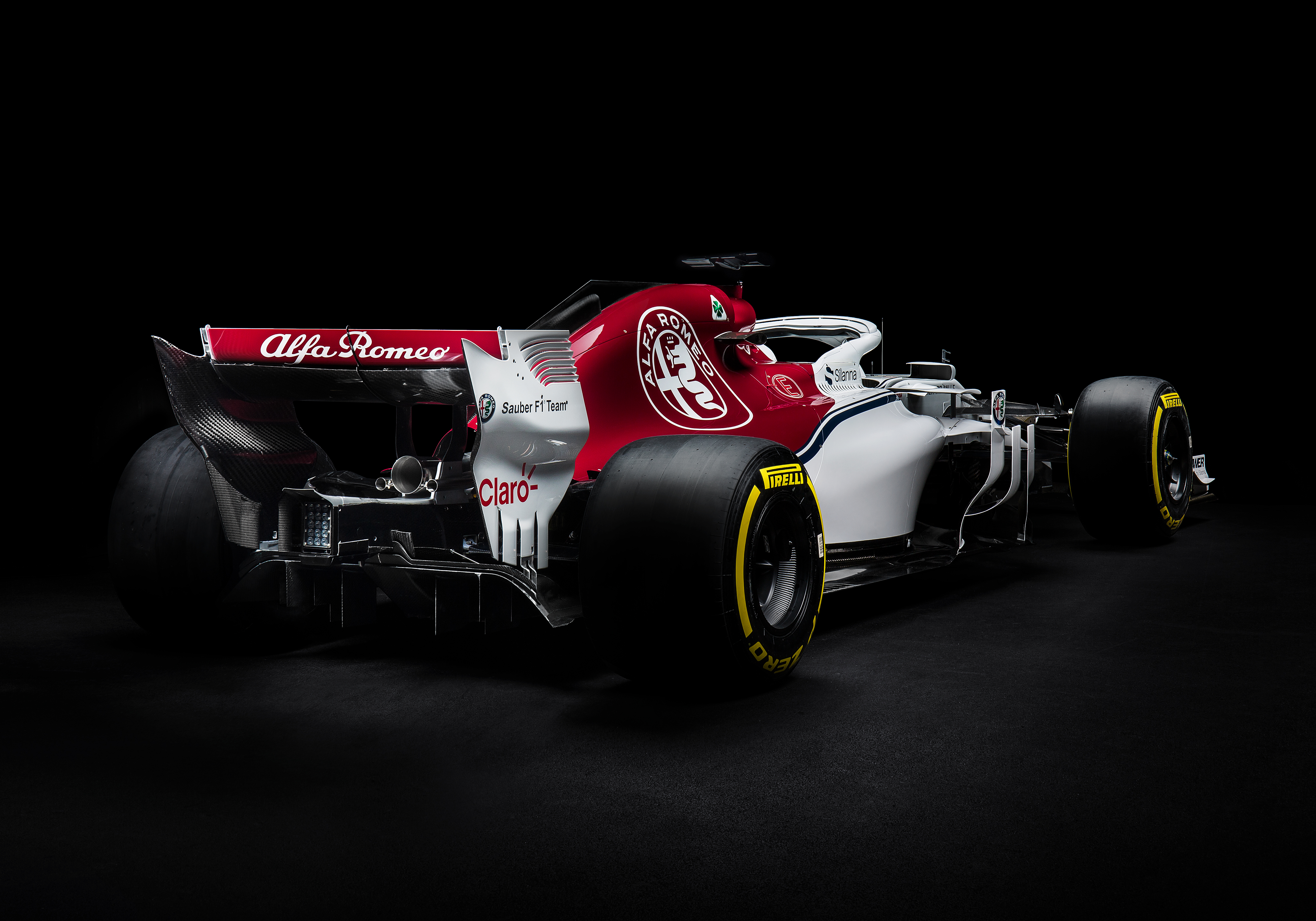 Альфа ромео формула. Alfa Romeo f1. F1 2019 Alfa Romeo. 2018 Alfa Romeo f1. Болид формула 1 Альфа Ромео.