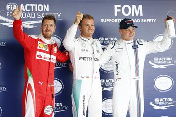 Тройка лучших в квалификации: Нико Росберг, Mercedes AMG, Себастьян Феттель, Ferrari, И Валттери Боттас, Williams Martini Racing